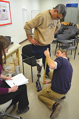 students aligning a prosthesis