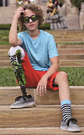 kid sitting on building steps