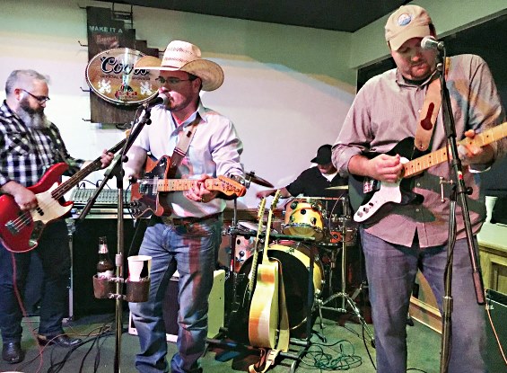 McGehee on stage with band